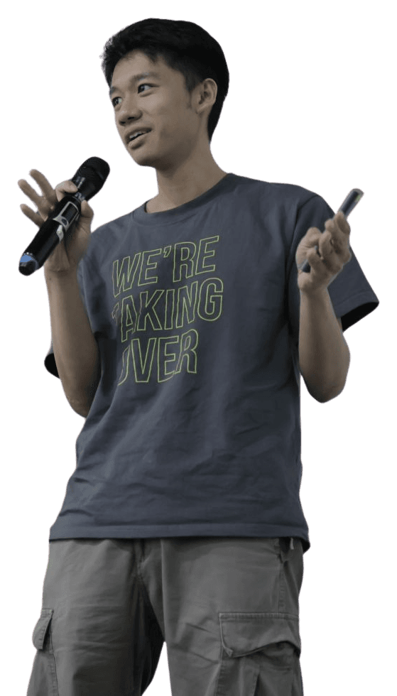 Brendan Beh speaking on stage