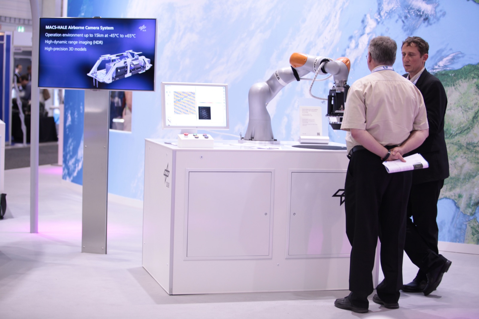 A sensor-equipped robot demonstrator at an aerospace exhibition